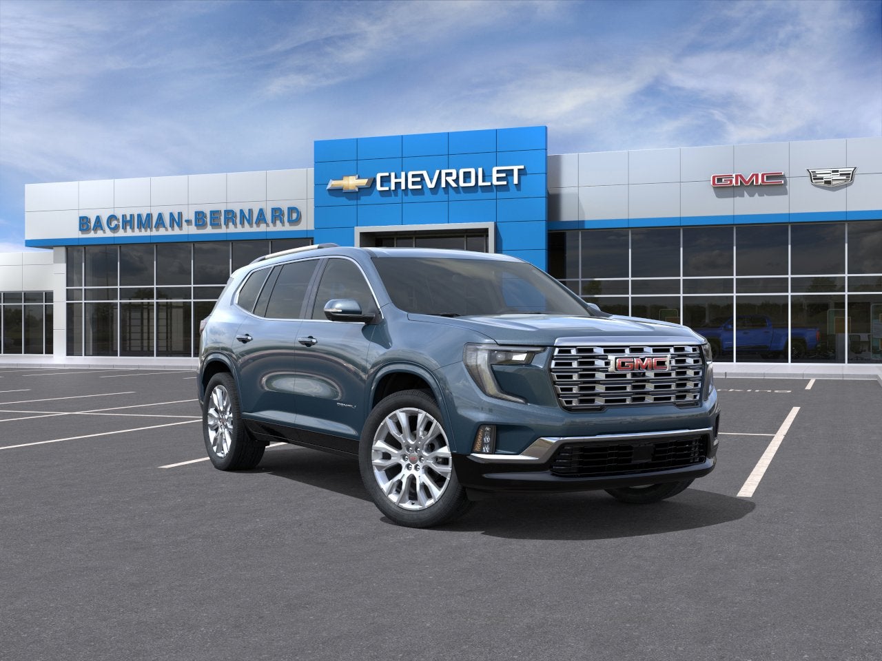 2026 GMC Acadia Denali in Downpour Metallic — front three-quarter view