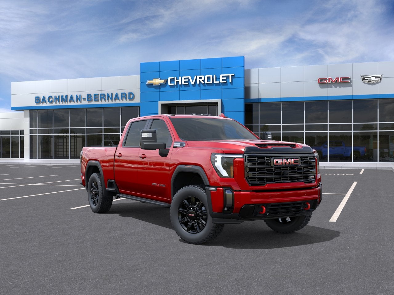 2026 GMC Sierra 2500 HD AT4 in Volcanic Red Tintcoat — front three-quarter view
